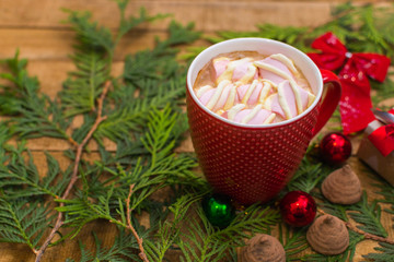 coffee with marshmallows in the red cup. Christmas and new year mood