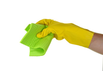 Woman's hand in rubber protective glove wiping white wall from dust with sponge cloths. Cleaning service or regular clean up concept.