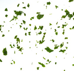 Fresh green chopped parsley leaves isolated on white background and texture, top view. Chopped parsley on a white background isolated. Chopped Parsley Leaves. Fresh Herbs 