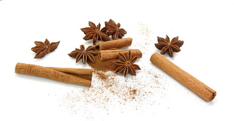 Cinnamon sticks and anise star isolated on white background close up. Spice Cinnamon sticks and...