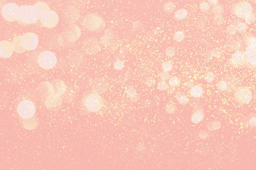 Abstract composition. Blurred photo of glitter with beautiful bokeh in peachy pink or cantaloupe color. Defocused light.