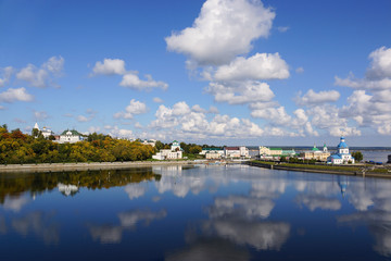 Obraz premium Cheboksary, Russia - September 10, 2019. View of the Cheboksary Bay and the Historical Embankment. On the right is the Church of the Assumption of the Mother of God