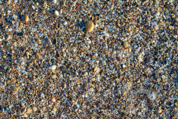 sea pebbles colored granite on the beach