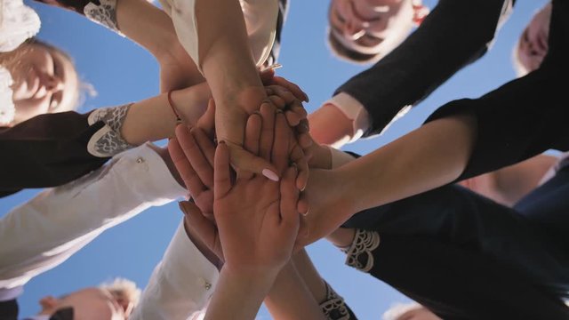 College Students Teamwork Stacking Hand Concept