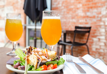 Fresh garden salad with beer
