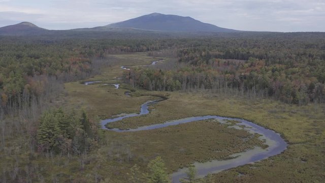 Mount Monadnock in New Hampshire during Autumn, aerial drone shot descending, 10-bit color
