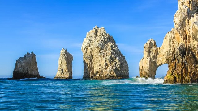 Los Arcos rock formation at Lands End in Cabo San Lucas, Baja California Sur, Mexico. Cinemagraph loop background.