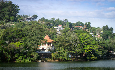 Fototapeta na wymiar The lake of Kandy city in Sri Lanka. Located at the center of city.