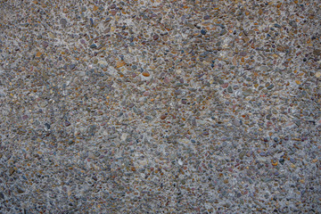 Cast mixture size and colour of pebble stone flooring or wall panel facade.