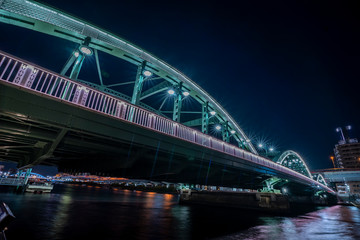 Fototapeta na wymiar 隅田川の風景　ライトアップした厩橋