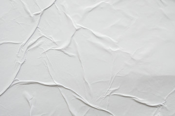 Blank white crumpled and creased paper poster texture background
