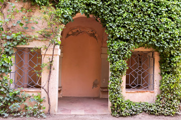old door in stone wall