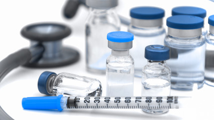 Tuberculin Syringe and Sterile Vial Filled with Medication Solution.