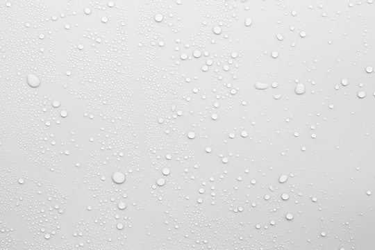 Water droplets on a gray background
