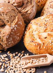 Fresh baked homemade wholegrain rolls or bread with seeds