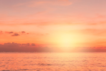 sunset sky with colorful cloud and dramatic sunlight on twilight over sea,amazing majestic nature sky background,idyllic beautiful cloudy with sunrise