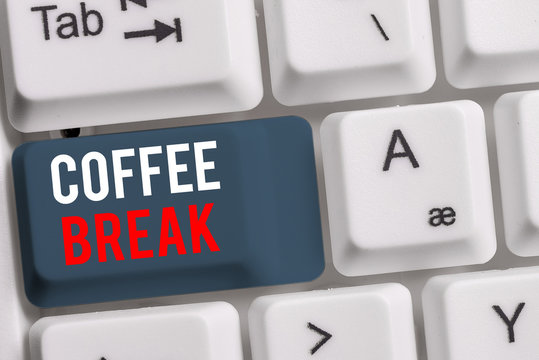 Handwriting text Coffee Break. Conceptual photo short time when you stop working to have a cup of coffee White pc keyboard with empty note paper above white background key copy space