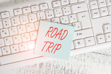 Conceptual hand writing showing Road Trip. Concept meaning Roaming around places with no definite...