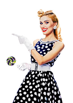 woman in pin-up style dress, showing something