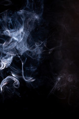 Smoke motion on black background.