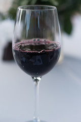 Elegant Red Wine Glass on Table
