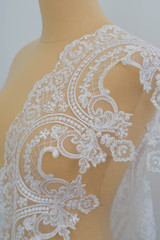 Obraz premium White lace stock photo on dummy, mannequin