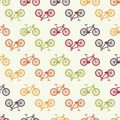 pattern of different sized and colored bicycles on light  background. colorful vector illustration 