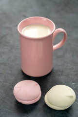 milk in a cup with cookies