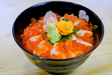 Sashimi bowl set.Sliced salmon and tuna,sea urchin(uni) and salmon roe in a bowl.Jepanese food.