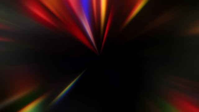 Rays glow. Superluminal motion. Multicolor gleam on black background.
