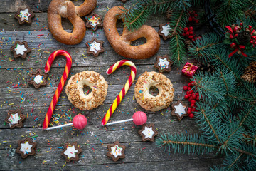 New Year 2020. Fir branches and sweets.