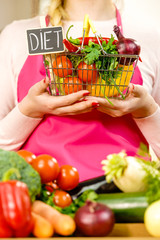 Shopping backet with dieting vegetables