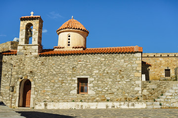 Fototapeta na wymiar Detail of architecture church in Vathia town, Mani Greece.