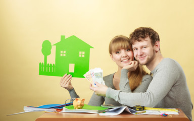 Young couple managing finances.