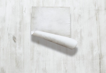 paper on wooden background