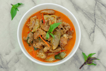 Beef in red curry with coconut milk and holy basil