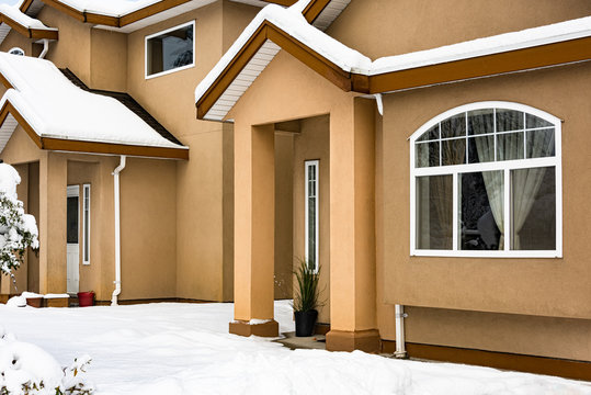 Facade of residential house on winter season in Canada.