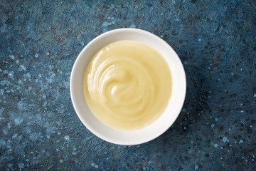 Close-up of vanilla sauce in white bowl
