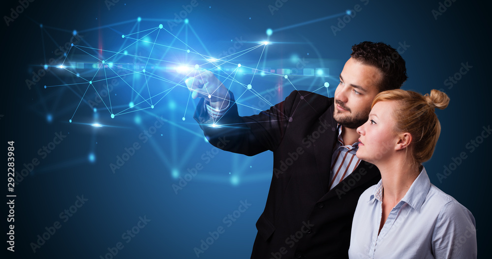 Aufkleber Man and woman touching hologram screen displaying modern web system