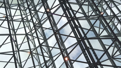 glass roof of a modern building. Overlapping roof of the building