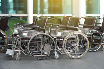 Fototapeta na wymiar Wheelchair in hospital background, Disabled background