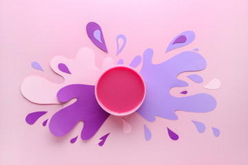 Container with sugaring paste on color background