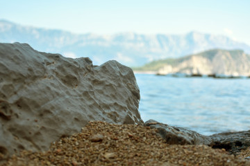 Fototapeta na wymiar Big stones on the seashore. Closeup photo
