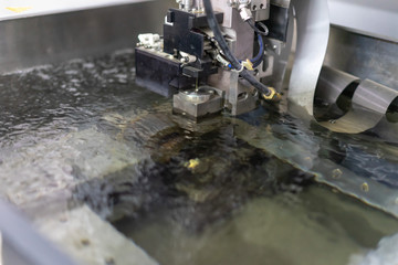 CNC wire cut machine cutting high precision mold parts 
