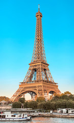 Fototapeta na wymiar Panoramic view of Eiffel tower and Seine river at golden sunset. Travel landmarks in Europe and France