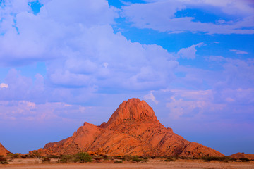 Spitzkoppe, beautiful hill in Namibia. Rock monument in the nature. Landscape in namibia. Stone in the nature, evening light in the rocky desert. Travel in Namibia, Africa. Große Spitzkoppe monument.