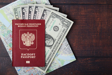 A passport with american dollars inside as work and travelling concept