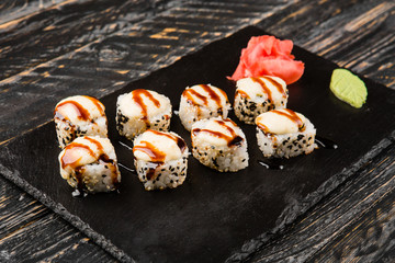 Delicious rolls with fish and cheese	