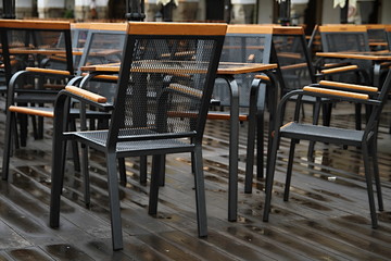 empty tables and chairs outside a restaurant area in London no people due to coronavirus pandemic lockdown stock photo