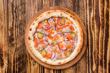 Delicious pizza with meat, cheese and mushrooms	